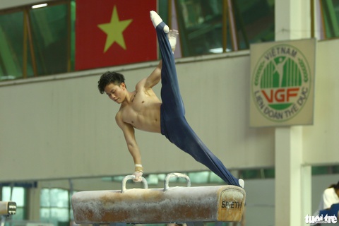 Những chàng trai 6 múi đội tuyển thể dục dụng cụ Việt Nam vắt sức cho SEA Games 31 - Ảnh 2. Những chàng trai 6 múi đội tuyển thể dục dụng cụ Việt Nam vắt sức cho SEA Games 31 - Ảnh 2.