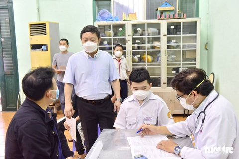 Sáng nay 16-4, TP.HCM bắt đầu tiêm vắc xin ngừa COVID-19 cho trẻ 5-12 tuổi - Ảnh 2. Sáng nay 16-4, TP.HCM bắt đầu tiêm vắc xin ngừa COVID-19 cho trẻ 5-12 tuổi - Ảnh 2.