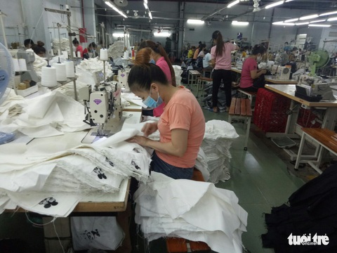 Đã trả gấp đôi mức lương tối thiểu, vì sao vẫn muốn lùi thời điểm tăng lương? - Ảnh 1. Đã trả gấp đôi mức lương tối thiểu, vì sao vẫn muốn lùi thời điểm tăng lương? - Ảnh 1.