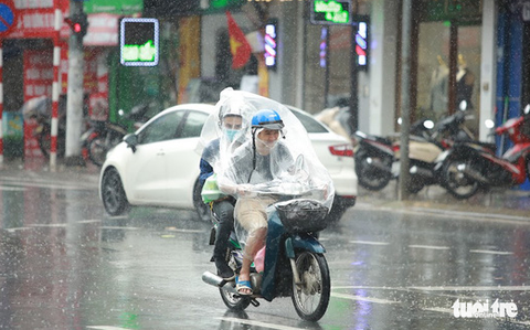 Miền Bắc mưa rét, Nam Bộ mưa rào và dông - Ảnh 1. Miền Bắc mưa rét, Nam Bộ mưa rào và dông - Ảnh 1.