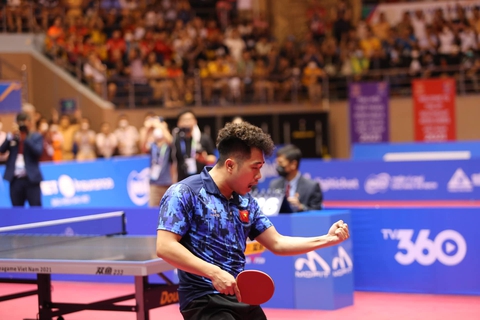 Nguyễn Đức Tuân giành HCV bóng bàn đơn nam ở SEA Games sau 19 năm - Ảnh 2. Nguyễn Đức Tuân giành HCV bóng bàn đơn nam ở SEA Games sau 19 năm - Ảnh 2.