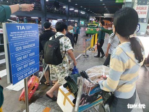 Tân Sơn Nhất thông thoáng ngày cuối cùng kỳ nghỉ lễ - Ảnh 4. Tân Sơn Nhất thông thoáng ngày cuối cùng kỳ nghỉ lễ - Ảnh 4.