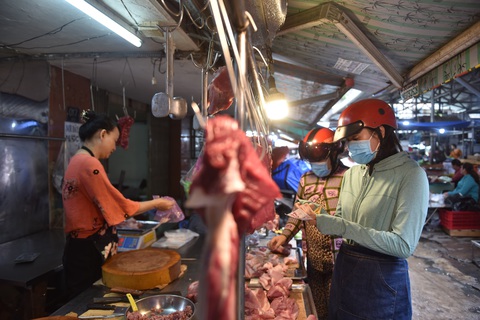 Ghìm lạm phát, hỗ trợ dân - Ảnh 1. Ghìm lạm phát, hỗ trợ dân - Ảnh 1.