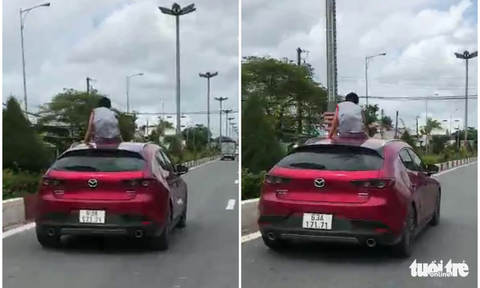Chở bé trai ngồi mui xe lao vun vút trên quốc lộ 1, nữ tài xế bị thu bằng lái 2 tháng - Ảnh 1. Chở bé trai ngồi mui xe lao vun vút trên quốc lộ 1, nữ tài xế bị thu bằng lái 2 tháng - Ảnh 1.