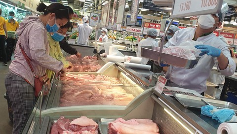 Giá heo hơi giảm, giá tại chợ không giảm - Ảnh 1. Giá heo hơi giảm, giá tại chợ không giảm - Ảnh 1.
