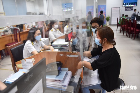 TP.HCM: Hồ sơ quyết toán thuế TNCN tăng đột biến, hoàn chỉ hơn 1,7 triệu đồng/hồ sơ - Ảnh 1. TP.HCM: Hồ sơ quyết toán thuế TNCN tăng đột biến, hoàn chỉ hơn 1,7 triệu đồng/hồ sơ - Ảnh 1.