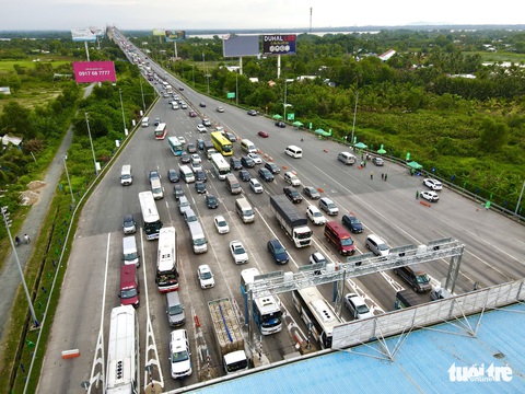 9h sáng 1-8, cao tốc TP.HCM - Long Thành sẽ xài 100% thu phí không dừng - Ảnh 1. 9h sáng 1-8, cao tốc TP.HCM - Long Thành sẽ xài 100% thu phí không dừng - Ảnh 1.