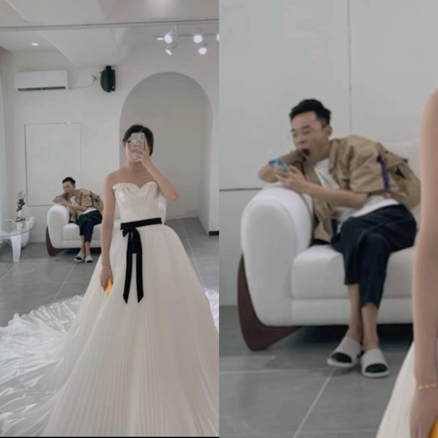 Chồng ngáp sái quai hàm chờ vợ thử váy cưới - Ảnh 1. Chồng ngáp sái quai hàm chờ vợ thử váy cưới - Ảnh 1.