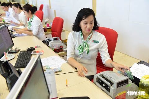 Sau nới room tín dụng: Nhân viên ngân hàng sợ... nghe điện thoại doanh nghiệp - Ảnh 2. Sau nới room tín dụng: Nhân viên ngân hàng sợ... nghe điện thoại doanh nghiệp - Ảnh 2.