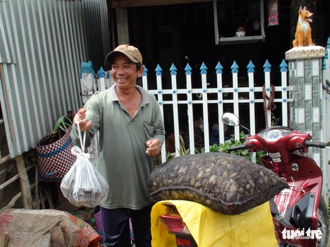 Làng lọp thu hoạch nửa tấn cua đồng mỗi ngày trong mùa nước nổi - Ảnh 4. Làng lọp thu hoạch nửa tấn cua đồng mỗi ngày trong mùa nước nổi - Ảnh 4.