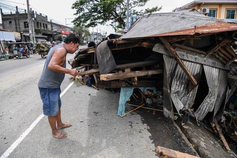 Philippines tan hoang sau khi siêu bão Noru tàn phá - Ảnh 5. Philippines tan hoang sau khi siêu bão Noru tàn phá - Ảnh 5.