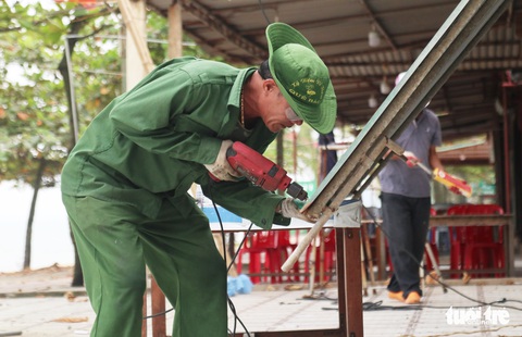 Bà con Cửa Lò tháo dỡ hơn 200 ki ốt, trả bãi biển cho cộng đồng - Ảnh 7. Bà con Cửa Lò tháo dỡ hơn 200 ki ốt, trả bãi biển cho cộng đồng - Ảnh 7.
