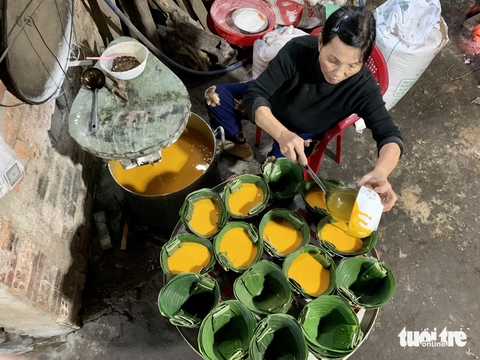 Làng nấu bánh tổ Hội An trắng đêm đón Tết - Ảnh 5. Làng nấu bánh tổ Hội An trắng đêm đón Tết - Ảnh 5.