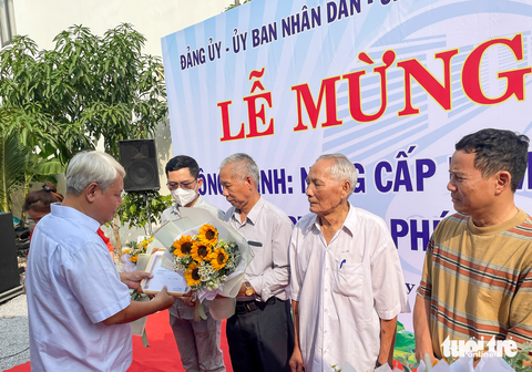 Tết Nguyên đán 2023, dân quận 7 phấn khởi với nhiều con hẻm được mở rộng - Ảnh 5. Tết Nguyên đán 2023, dân quận 7 phấn khởi với nhiều con hẻm được mở rộng - Ảnh 5.