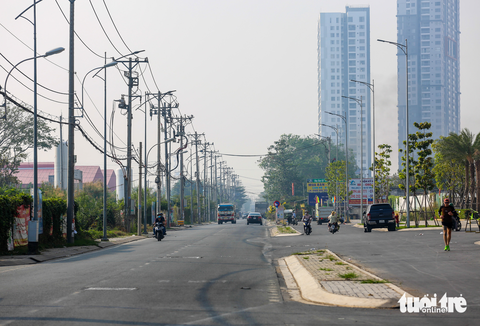 Tết Nguyên đán 2023, dân quận 7 phấn khởi với nhiều con hẻm được mở rộng - Ảnh 6. Tết Nguyên đán 2023, dân quận 7 phấn khởi với nhiều con hẻm được mở rộng - Ảnh 6.