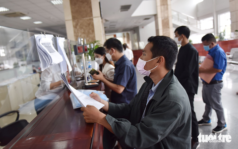 Đề xuất nâng mức giảm trừ, hạ bậc thuế thu nhập cá nhân - Ảnh 4. Đề xuất nâng mức giảm trừ, hạ bậc thuế thu nhập cá nhân - Ảnh 4.