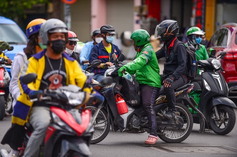 Grab thu phụ phí Tết 5.000 - 15.000 đồng/chuyến - Ảnh 1. Grab thu phụ phí Tết 5.000 - 15.000 đồng/chuyến - Ảnh 1.