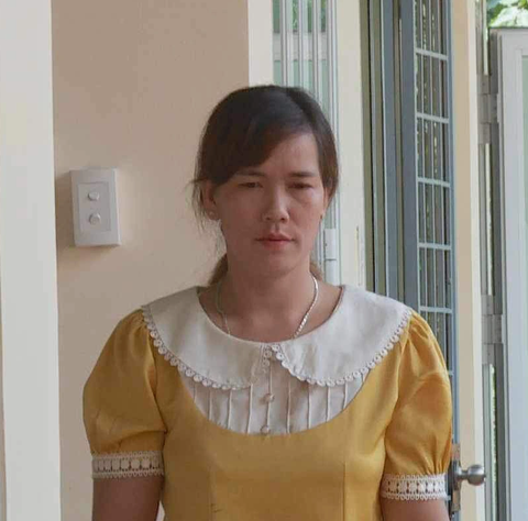 Bà Lên tại cơ quan công an - Ảnh: S.Đ. Hoàng Thị Lên thừa nhận đã lừa hai mẹ con chị S. bán sang Trung Quốc - Ảnh: S.Đ.