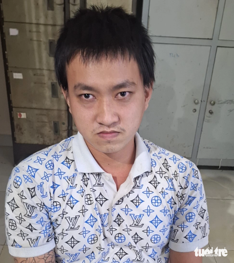 Đỗ Trần Nhật Linh tại cơ quan công an - Ảnh: THANH TUẤN