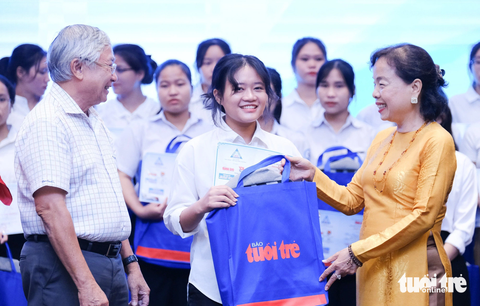 Tiếp sức đến trường khu vực Quảng Nam - Đà Nẵng: Dù khó khăn đến đâu cũng đừng bỏ cuộc - Ảnh 22. Gương mặt rạng rỡ của các tân sinh viên Quảng Nam - Đà Nẵng tại lễ trao học bổng Tiếp sức đến trường ngày 15-10 - Ảnh: TẤN LỰC