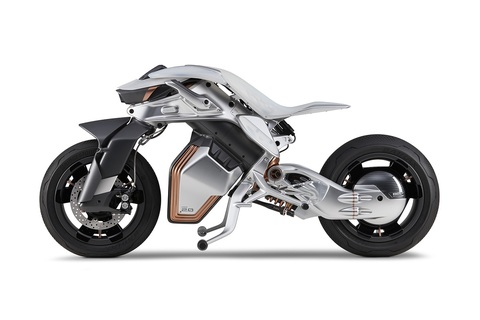 Xe máy Yamaha tự cân bằng, tự chống chân, nhận diện chủ nhân - Ảnh 2. Yamaha MOTOROiD2 mang thiết kế của một mẫu xe tương lai. Phần đầu có hình dạng giống như người ngoài hành tinh vô định hình. Điểm nhấn bằng đồng tương phản với thân thép và sơn trắng. Hệ thống ánh sáng thay đổi màu sắc theo tâm trạng chạy dọc phần đầu xe