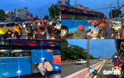 ‘Bến cóc’ mọc lên như nấm, bao vây bến xe Miền Đông ở quận Bình Thạnh - Ảnh 6. Trong ảnh là xe khách Việt Tân Phát (màu xanh dương) vừa ra khỏi bến xe Miền Đông cũ đã đón khách dọc đường mà phóng viên đã theo sát, ghi nhận được vào tối 22-10