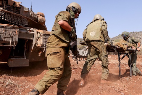 Quân nhân Israel trong một cuộc diễn tập quân sự tại khu vực gần biên giới Lebanon ngày 24-10 - Ảnh: AFP Quân nhân Israel trong một cuộc diễn tập quân sự tại khu vực gần biên giới Lebanon ngày 24-10 - Ảnh: AFP