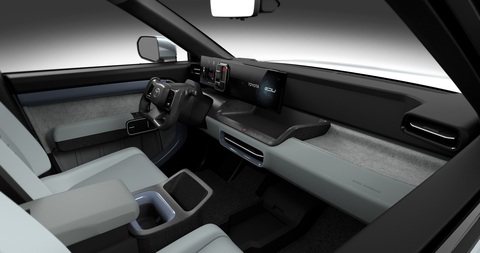 Toyota công bố bán tải điện, vẫn chưa chắc chắn đưa vào sản xuất - Ảnh 3. Nội thất xe có không gian để đồ giữa 2 ghế trước khá rộng vì màn trung tâm đã bị kéo lệch sang bên ghế lái - Ảnh: Toyota
