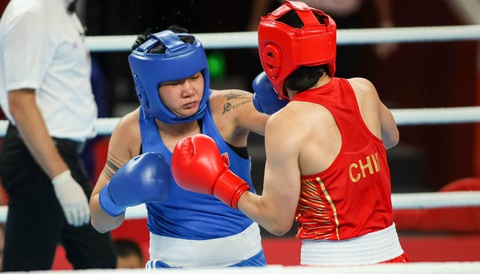 Asiad 19: Cầu mây Việt Nam vào chung kết tranh HCV - Ảnh 2. Diễm Quỳnh (giáp xanh) đã thất bại 0-5 trước đối thủ chủ nhà Li Qian - Ảnh: QUÝ LƯỢNG