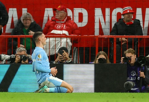 Haaland lập cú đúp, Man City 'nhấn chìm' Man United - Ảnh 4. Foden ghi bàn thắng ấn định tỉ số 3-0 cho Man City trước Man United - Ảnh: REUTERS