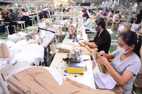 Doanh nghiệp đang rất cần sẻ chia và hỗ trợ - Ảnh 1. Ngành dệt may đang gặp nhiều khó khăn - Ảnh: QUANG ĐỊNH