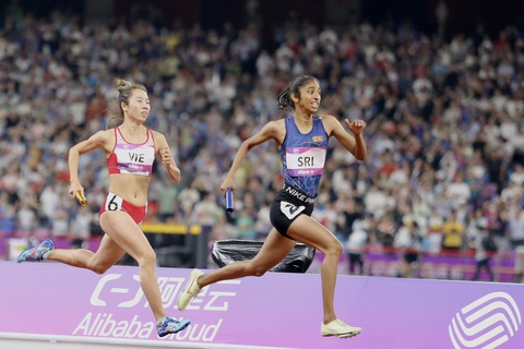 Asiad 19 ngày 4-10: Đội tiếp sức 4x400m nữ Việt Nam chỉ xếp hạng 4 - Ảnh 1. Đội tiếp sức 4x440m nữ của Việt Nam đã không thể giành huy chương tại Asiad 19 - Ảnh: ĐỨC KHUÊ
