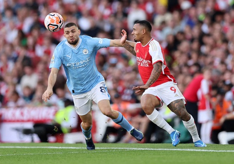 Thua Arsenal, Man City mất ngôi đầu bảng Premier League - Ảnh 4. Arsenal chơi thứ bóng đá cực kỳ kiên nhẫn và nhận được quả ngọt trước Man City - Ảnh: REUTERS