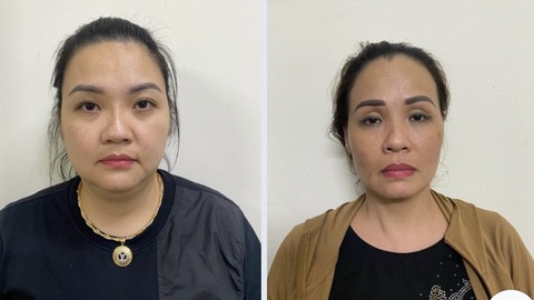 Bắt 2 chị em cầm đầu đường dây mang thai hộ giá 1,5 tỉ đồng - Ảnh 1. Bị can Vân và Thuận tại cơ quan công an - Ảnh: Công an cung cấp