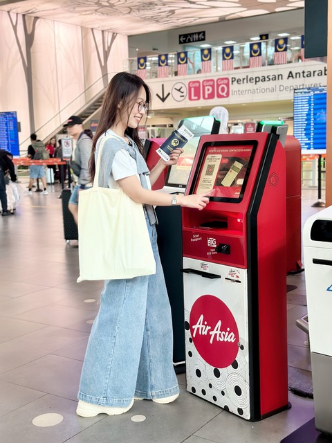 Tìm bí kíp của hãng hàng không giá rẻ AirAsia - Ảnh 2. Tìm bí kíp của hãng hàng không giá rẻ AirAsia - Ảnh 2.