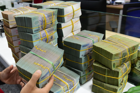 Giao dịch từ 400 triệu đồng phải báo cáo Ngân hàng Nhà nước- Ảnh 1. Từ ngày 1-12, giao dịch từ 400 triệu đồng phải báo cáo Ngân hàng Nhà nước - Ảnh: NGỌC PHƯỢNG