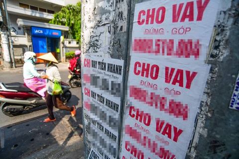 Bỗng nhiên khó vay tiêu dùng- Ảnh 1. Công ty tài chính giảm cho vay, các kiểu cho vay không phép, tín dụng đen trỗi dậy - Ảnh: Q.Đ.