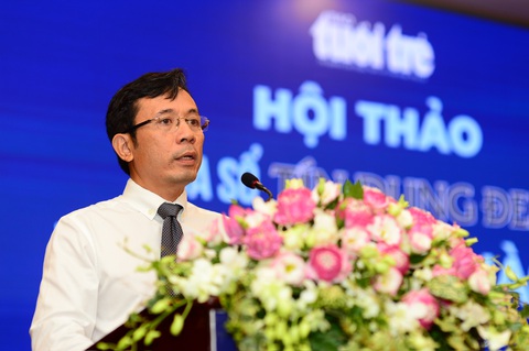 Bàn giải pháp xóa sổ tín dụng đen- Ảnh 4. Nhà báo Trần Xuân Toàn, phó tổng biên tập báo Tuổi Trẻ, phát biểu tại hội thảo - Ảnh: QUANG ĐỊNH
