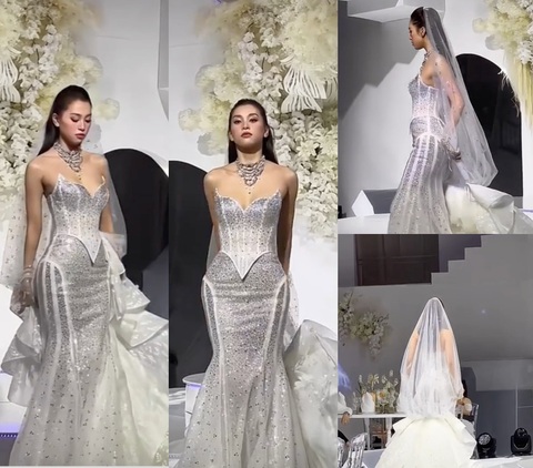 Màn xử lý sự cố váy áo của HH Tiểu Vy nhận ý kiến trái chiều - Ảnh 2. Nàng hậu quyết định đi vào cánh gà để ê kíp tháo phần váy bị vướng thay vì tự xử lý