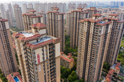 Phức hợp nhà ở do tập đoàn bất động sản China Vanke xây dựng ở thành phố Trịnh Châu, tỉnh Hà Nam (Trung Quốc) - Ảnh: AFP Khu phức hợp nhà ở do Tập đoàn bất động sản China Vanke xây dựng ở thành phố Trịnh Châu, tỉnh Hà Nam (Trung Quốc) - Ảnh: AFP