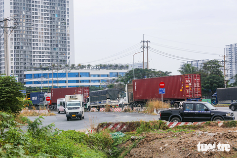 Sắp đóng nút giao Nguyễn Văn Linh - Nguyễn Hữu Thọ để xây hầm- Ảnh 3. Một nút giao dự kiến được mở rộng để xe cộ quay đầu khi nút giao Nguyễn Văn Linh - Nguyễn Hữu Thọ tạm đóng - Ảnh: CHÂU TUẤN