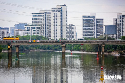 Tháo dỡ cầu sắt Rạch Đỉa nối quận 7, Nhà Bè để làm cầu mới- Ảnh 12. Sau khi hoàn thành, cầu Rạch Đỉa mới sẽ tăng tính kết nối của khu vực và giúp giảm tải cho cầu Rạch Đỉa 2 trên đường Nguyễn Hữu Thọ vốn đã quá tải, thường xuyên ùn tắc vào giờ cao điểm - Ảnh: LÊ PHAN