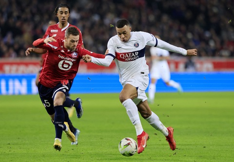 Tin tức thể thao sáng 18-12: Bellingham, Harry Kane cùng tỏa sáng- Ảnh 3. PSG (áo trắng) không thể có 3 điểm trước Lille - Ảnh: REUTERS