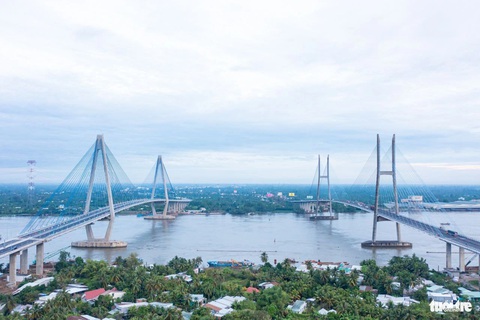 Thông xe cầu Mỹ Thuận 2 và cao tốc Mỹ Thuận - Cần Thơ- Ảnh 2. Cầu Mỹ Thuận 2 nằm cách cầu Mỹ Thuận hiện hữu 350m về phía thượng nguồn sông Tiền, nối hai tỉnh Tiền Giang - Vĩnh Long - Ảnh: MẬU TRƯỜNG