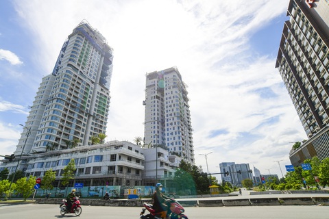 Bất động sản năm nay lương tháng còn khó, nói gì thưởng Tết- Ảnh 1. Khó khăn lớn nhất năm nay của doanh nghiệp địa ốc là vấn đề dòng tiền, việc duy trì tháng lương thứ 13 với nhiều công ty cũng đã khó khăn - Ảnh: QUANG ĐỊNH