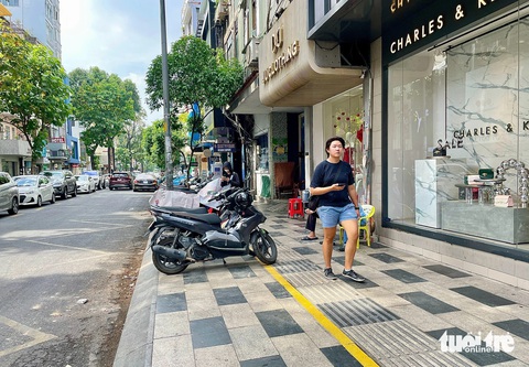 TP.HCM bắt đầu hướng dẫn thu phí lòng đường, vỉa hè- Ảnh 1. TP.HCM kỳ vọng trật tự lòng đường, vỉa hè quy củ, nề nếp hơn trong thời gian tới - Ảnh: CHÂU TUẤN