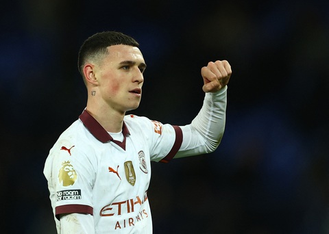 Foden ghi tuyệt phẩm sút xa, Man City đánh bại Everton- Ảnh 1. Tuyệt phẩm sút xa của Foden mở ra cuộc lội ngược dòng cho Man City - Ảnh: REUTERS