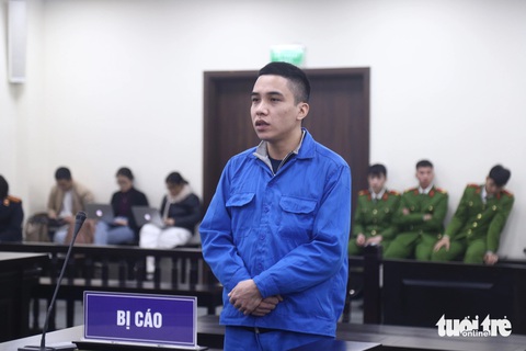 Xét xử cựu cảnh sát giao thông bắt cóc bé trai đòi chuộc 15 tỉ- Ảnh 1. Cựu thượng úy cảnh sát giao thông Nguyễn Đức Trung tại tòa - Ảnh: DANH TRỌNG