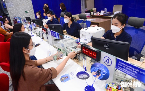 Hiệp hội Bất động sản TP.HCM kiến nghị ngân hàng vẫn làm việc vào 30 và 31-12- Ảnh 1. Hiệp hội Bất động sản TP.HCM kiến nghị ngân hàng vẫn làm việc vào 30 và 31-12 để doanh nghiệp có thêm hai ngày giao dịch - Ảnh: QUANG ĐỊNH