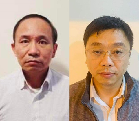 Bắt giam phó vụ trưởng và phó chánh văn phòng Bộ Thông tin và Truyền thông liên quan đại án AIC- Ảnh 2. Ông Ngô Quang Huy (phải) và ông Nguyễn Trọng Đường tại cơ quan điều tra - Ảnh: Bộ CA
